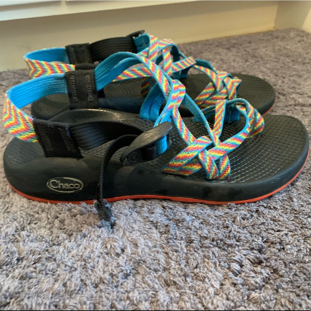Double-strap rainbow Chacos.